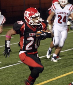 Renton's Anthony Gold runs against Kennedy Catholic Oct. 7.