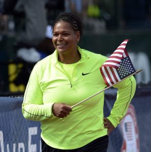 Aretha Thurmond runs a victory lap after qualifying for the 2012 Olympic Games in London.