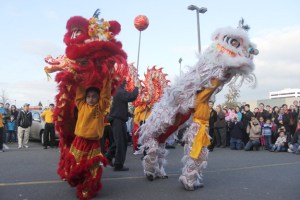 Members of the International Lion Dance and Martial Arts Team celebrate the Lunar New Year Sunday at Uwajimaya in Renton.