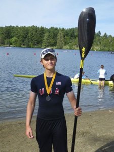 Michael Weyna with a gold medal he earned at the Lake Placid International Regatta July 2-3. Weyna trains at Cascade Canoe & Kayak in Renton.
