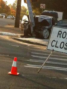 This car crashed into the the pole for the traffic signal at Petrovitsky Road and 140th Avenue Southest in Fairwood after 5 p.m. Thursday
