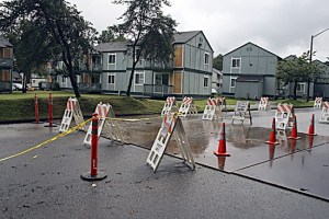 A second sinkhole opened up on Royal Hills Drive on Wednesday. The road is now covered with steel plates. The City of Renton will inspect the line Friday to determine its condition.