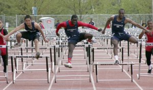 Lindbergh's Calebse Cange clears the final hurdle in the 110-meter hurdles May 4.