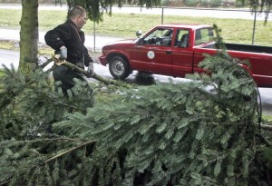 A City of Renton maintenance worker cleans up debris at the Maplewood Golf Course following the January storms.