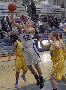 Liberty's Aspen Winegar puts up a shot against Hazen Dec. 22.