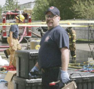 Renton Fire Department’s Mark Bailey was in charge of checking patients with the hand-held radiation detector after they have been decontaminated