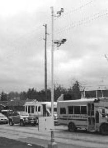 Cameras and videos that will document those who run a red light at four intersections in Renton include the one at southbound East Valley Highway and Southwest 43rd Street. The city also has installed signs that the cameras are in place.