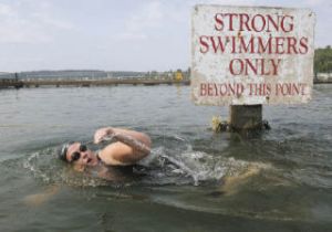 Rachel O’Brien swims laps at Gene Coulon Memorial Beach Park in preparation for her fourth Danskin triathlon. Once about 300 pounds