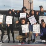 Nearly 200 Renton High students walked to City Hall on Monday holding signs in protest of the presidential election results. (Leah Abraham | Renton Reporter)