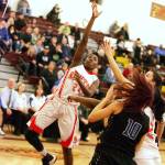 Renton guard Tamika Barbee-Welch shoots against Olympic High at Mount Tahoma in the 2A regional round of state. Dennis Box, The Reporter