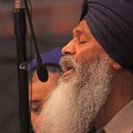 Bhai Mann Singh performs a ceremonial song during the community rally at Kent Lutheran Church on Saturday. MARK KLAAS, Kent Reporter