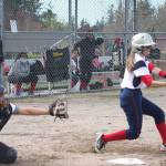 Eagles junior Ashlynn Seely takes a swing at a pitch from Tyee during Monday&rsquo;s win.