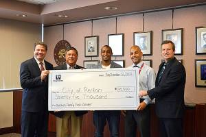 From left, King County Councilman Reagan Dunn, Mayor Denis Law, Seattle Seahawk Doug Baldwin, Renton School District Superintendent Damien Pattenaude and King County Councilman Dave Upthegrove. (Courtesy photo)