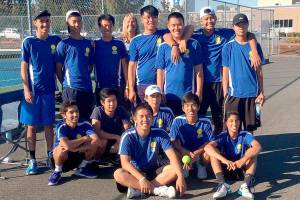 Hazen boys tennis poses for a team photo &mdash; Standing: William McGraw, Nick Ngo, Kenny Nguyen, Coach Gail Ellis, Alex Huynh, Marcus Lee, Alex Nguyen, Tim Wong. Seated: Stefanos Pamboukas, Steven Lu, James Chen, Jeremiah Lee, Ryan Ung, Sohil Shah. (Courtesy photo)