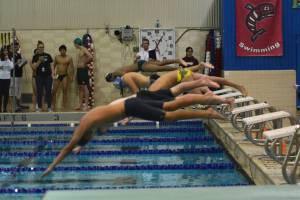 Hazen swim wins first meet of the season
