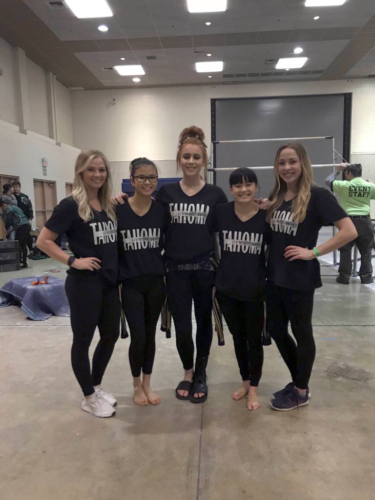 (From left to right) Tahoma coach Randi Schorzman, gymnasts Elsie Rochleau, Hayley Rayburn and Emma Rochleau and coach Erica Bonthuis pose for a photo during the weekends state meet. Courtesy photo