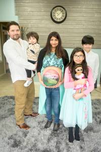 Travis and Lax Burt with Samsara and their three children, Bodhi (meaning enlightenment), Areya (pure soul), and Rishi (seeker of truth). Submitted photo