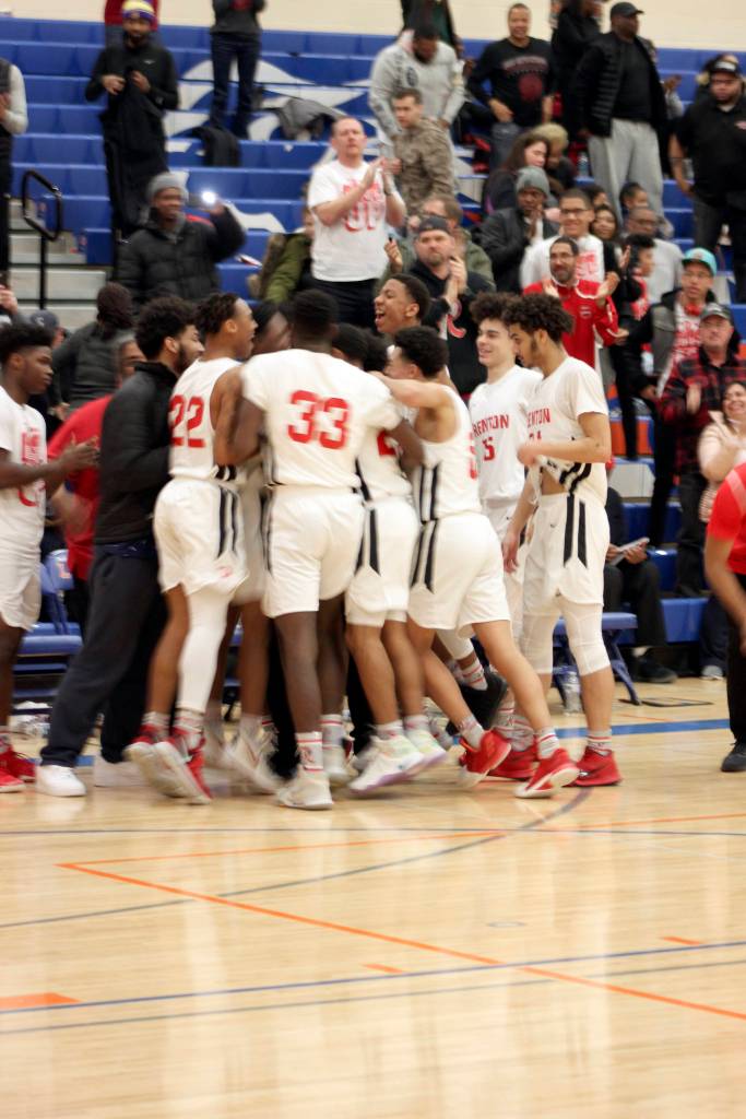 The Renton Indians boys basketball team beat Clover Park 58-49 Feb. 23 in regionals. Photos by Sarah Brenden