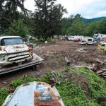 The 10 acre plot known as Iron Mountain is home to countless broken-down cars, boats, fire trucks, buses, and even a street sweeper. The sprawling junkyard encircles Pillons home. Photo by Caean Couto