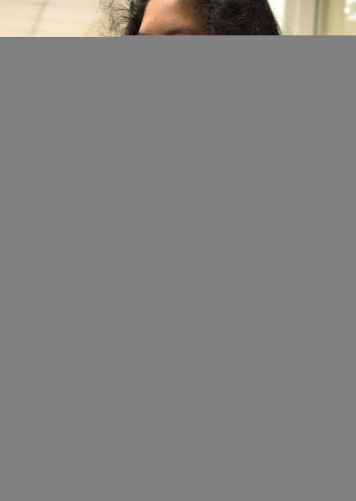 Jessica Monroy, a Lindbergh High School student, learns how to use the technology that will be used at the Girls Exploring Tech camp. Photo by Kayse Angel