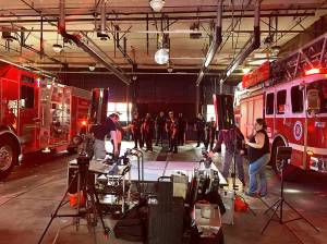 Photo courtesy of Renton Police Department                                Officers and Firefighters learning the dance moves for the video.