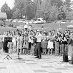 Courtesy photo                                Kindering staff perform a sing-a-long during the Aug. 15 graduation ceremony.
