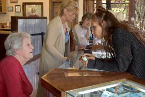 Evergreen cannabis educator Elan Gratix shows Connie some topical cannabis alternatives from smoking. Photos by Haley Ausbun.