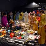 Yoshi Williams, cosplaying as the Painted Lady from Avatar: the Last Airbender, is one of several cosplayers looking through the items on sale at the Anime World booth, Saturday, Sept. 15 at RenCon at Hotel Interurban in Tukwila.