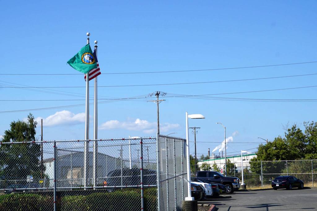 Smoke from nearby plants can be seen at NWDCs entrance. Photo by Melissa Hellmann