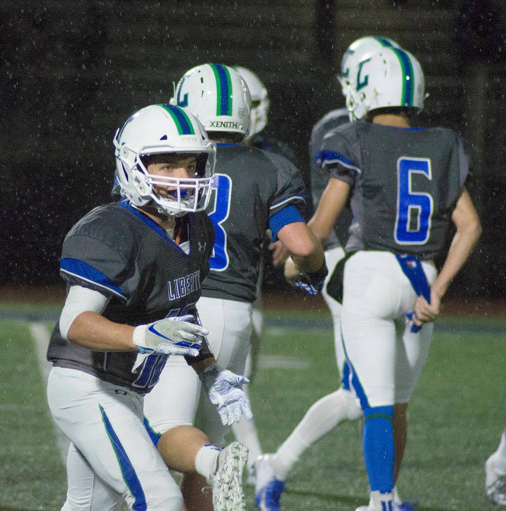 Photos By Kayse Angel. Liberty scored six touchdowns during Fridays win over Lake Washington.