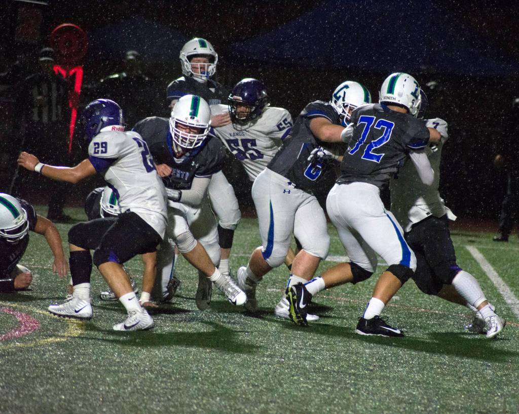 Photos By Kayse Angel. Liberty scored six touchdowns during Fridays win over Lake Washington.