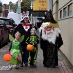 Brad, Jennifer, Ian and Bailey Detrick take to the streets in their Halloween best.
