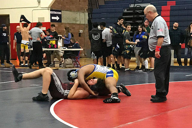 Joseph Aguirre pins his Renton opponent at the edge of the mat. Courtesy photo