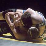 Jayden Hewitt from Hazen and Victor Juarez battle at heavyweight. Photo by Kayse Angel