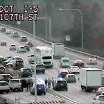 Law enforcement vehicles at the scene of a crash on I-5 near Northgate in Seattle after a chase that began in Lynnwood on Wednesday. (Washington State Department of Transportation)