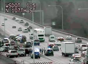 Law enforcement vehicles at the scene of a crash on I-5 near Northgate in Seattle after a chase that began in Lynnwood on Wednesday. (Washington State Department of Transportation)