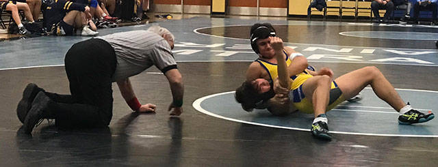 Gabe Silva pins his Kennedy opponent. Courtesy photo