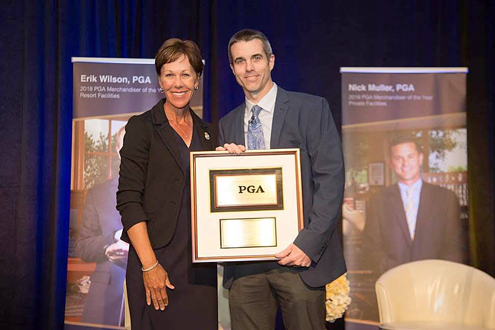 Photo by Hailey Garrett/PGA of America                                PGA of America President, Suzy Whaley and 2018 PGA Merchandiser of the Year Public Facilities recipient, Mark Rashell pose during the PGA Merchandiser of the Year Awards in Florida Jan. 19.
