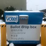 Photo by Haley Ausbun.                                Few cars made it through the snow and slushy roads around noon on Monday, Feb. 11, and the parking lot of Rentons King County Elections Office was no exception.