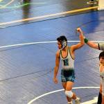 Chinda Xayasanh wins his 113 pound match. Courtesy photo