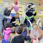 Photo courtesy Renton Schools Facebook page                                Tracy Dyson, from Hazelwood Elementary School, is one of the Renton Chamber of Commerces 2019 Ahead of the Class teachers. Renton Superintendent Dr. Damien Pattenaude and Blitz surprised Dyson April 3.