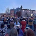 The street was packed with folks looking up to witness the lighting of the new dragon sculpture in downtown Renton, with LED eyes and mouth that can change colors and will be lit year-round. Submitted photo by Andre Osorio.