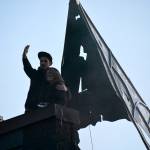 Western Neons Dylan Neuwirth and Municipal Arts Commissions Marsha Rollinger had the honor of lighting the dragon during the unveiling. Photo by Haley Ausbun.