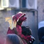 A very young dragon waits for the lighting of the much larger rooftop dragon. Photo by Haley Ausbun.