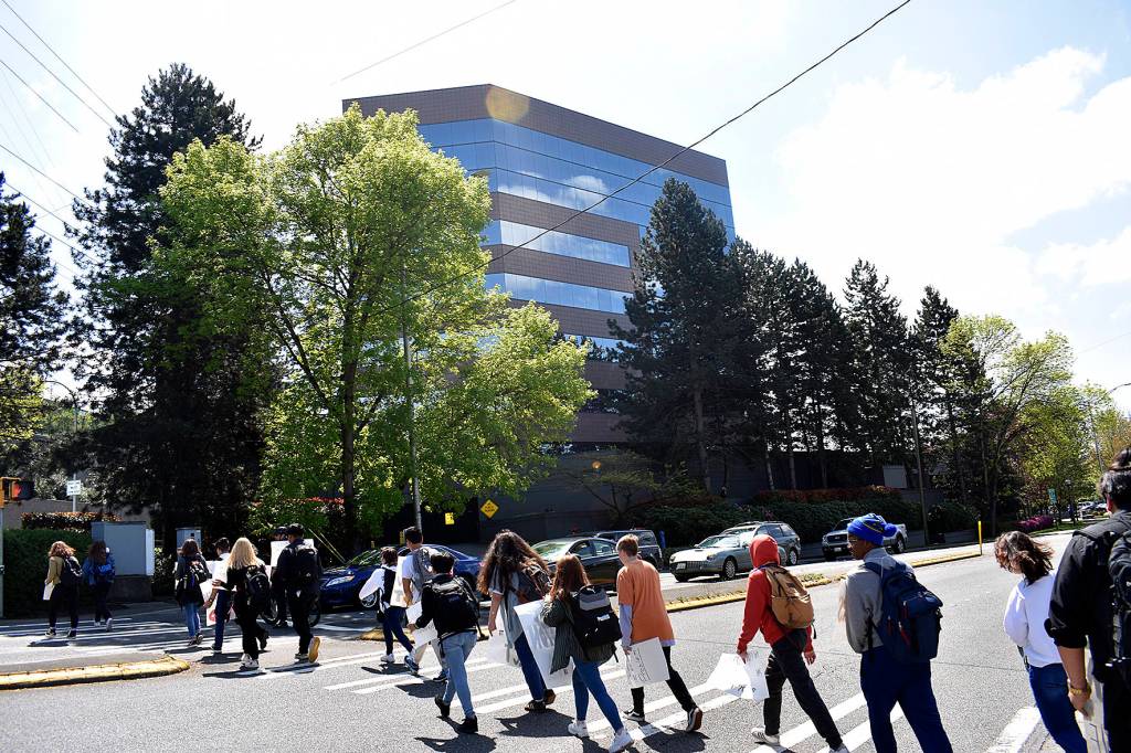 Photo by Haley Ausbun. Students protesting for sustainability in Renton approach city hall after a nearly 90-minute walk.