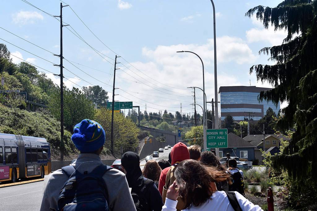 Photo By Haley Ausbun. About 20 Hazen High School students walked out of classes Friday, April 26, and marched to Renton City Hall to ask for sustainability and the fight against climate change locally.