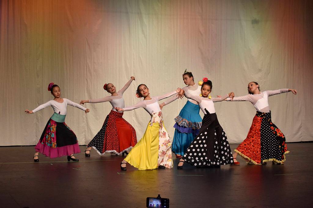 Photos by Haley Ausbun                                Semilla Flamenca in Redmond had their spring recital Friday, April 26 at the Carco Theatre in Renton. Nearly 60 flamenco dancers, from 2 year olds to adults, were able to show off their skills in ten performances, concluding with a group dance of the Macarena. All proceeds for the recital went to a 6-year-old dancer who has been fighting leukemia for three years and is now in remission with monthly check-ups, flamenco teacher Paulina Chalita-White said.