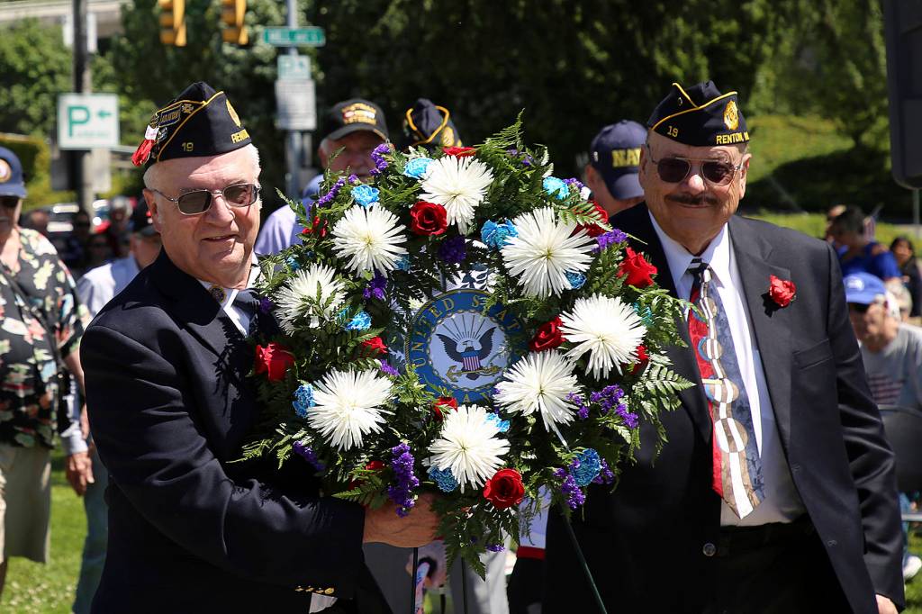 The city of Renton honored its fallen veterans on Monday, May 27 at Veterans Park.                                The event included an invocation from the Veterans of Foreign Wars (VFW) and American Legion Chaplain Bruce Feltmann, presentation of the colors from Renton Police Department Color Guard, councilmember Carol Ann Witschi performing the National Anthem and God Bless America, as well as speakers Mayor Denis Law, veteran Darrell Pilat and army veteran David Waggoner.                                Several veterans presented wreaths, courtesy of Greenwood Memorial Park and Funeral Home in Renton.                                Photos courtesy of city of Renton.