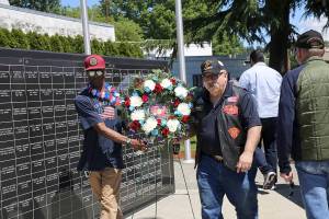 The city of Renton honored its fallen veterans on Monday, May 27 at Veterans Park.                                The event included an invocation from the Veterans of Foreign Wars (VFW) and American Legion Chaplain Bruce Feltmann, presentation of the colors from Renton Police Department Color Guard, councilmember Carol Ann Witschi performing the National Anthem and God Bless America, as well as speakers Mayor Denis Law, veteran Darrell Pilat and army veteran David Waggoner.                                Several veterans presented wreaths, courtesy of Greenwood Memorial Park and Funeral Home in Renton.                                Photos courtesy of city of Renton.