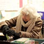 2016 volunteer Carol Abrahamson helps sort food at the Salvation Army Renton Rotary Food bank. From the Renton Reporter archives.